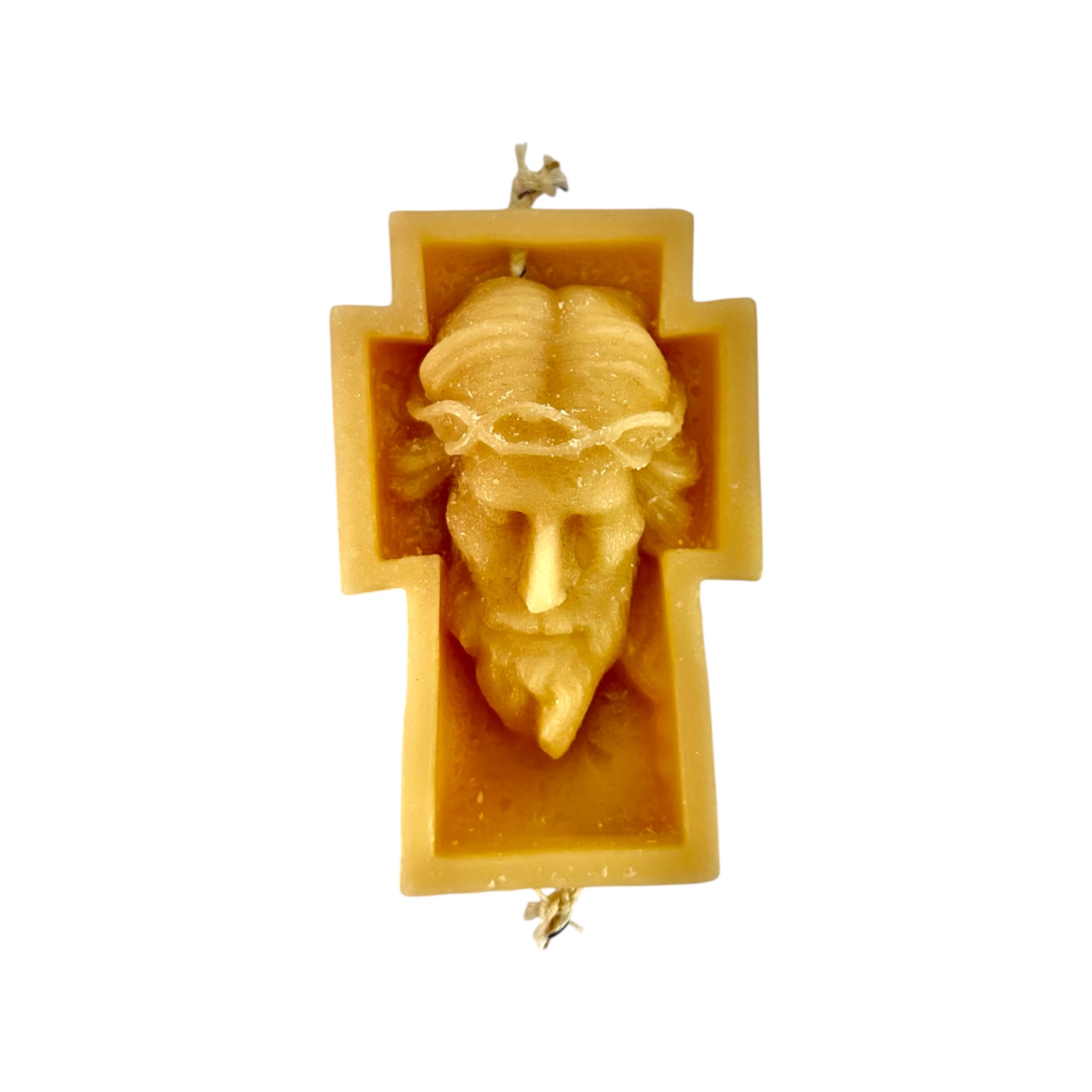 Cruz con rostro religioso